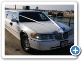 Ideal wedding car for you and your wedding party is our white town car limousines, call us today to see how we can make your day extra special